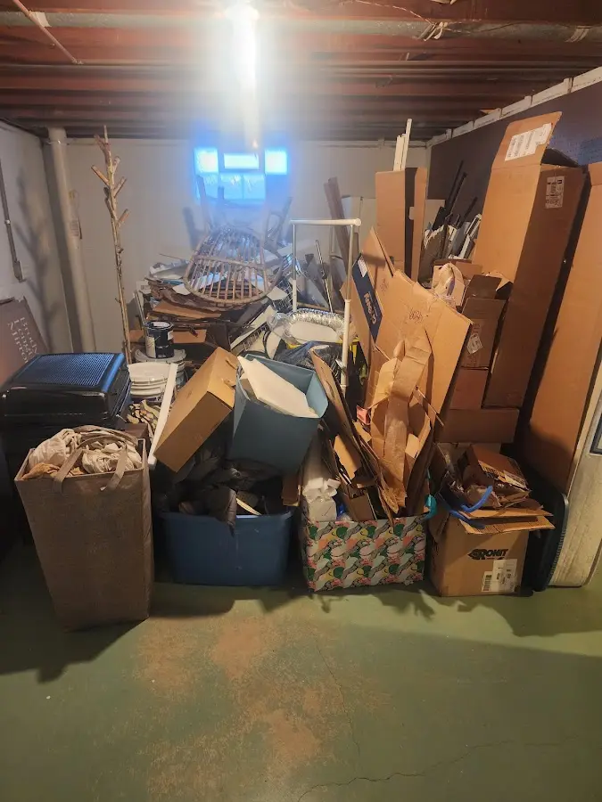 Roll-off dumpster container at job site for Construction Dumpster Rental in Spring Lake Park